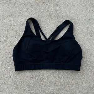 Women’s black Lululemon cross back sports bra with original paddings